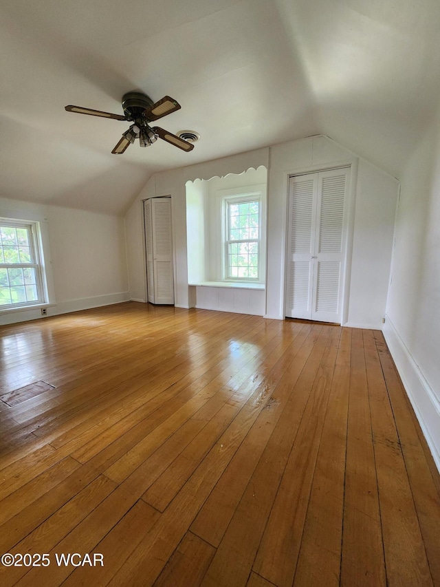 11205 Rd Z, Columbus Grove, OH 45830 - additional living space featuring lofted ceiling, wood-type flooring, healthy amount of natural light, and ceiling fan