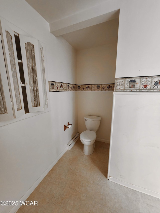 11205 Rd Z, Columbus Grove, OH 45830 - bathroom with a baseboard heating unit and toilet