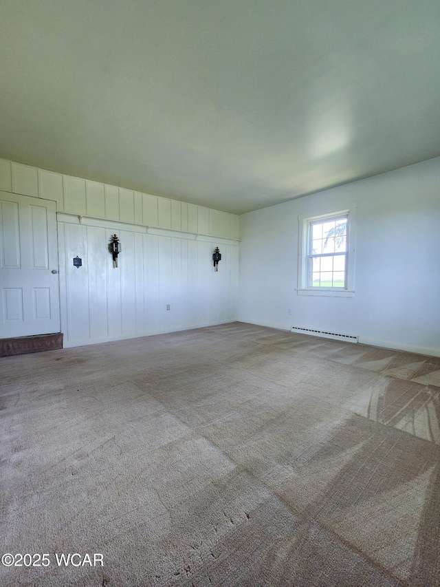 11205 Rd Z, Columbus Grove, OH 45830 - spare room with carpet and a baseboard radiator