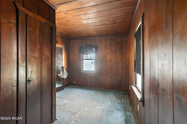 513 Gordon Ave, Van Wert, OH 45891 - unfurnished room with wood ceiling, wood walls, and carpet floors