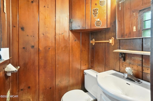 513 Gordon Ave, Van Wert, OH 45891 - bathroom featuring a sink and wooden walls