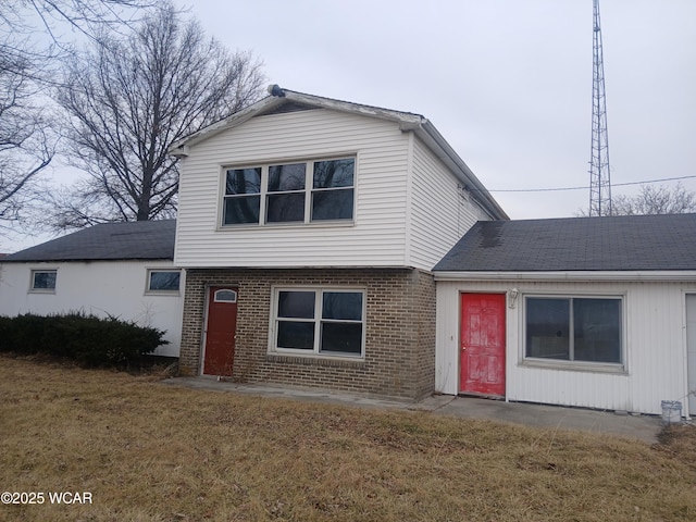 view of property with a front lawn