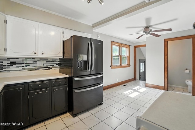 1574 Oakland Pkwy, Lima, OH 45805 - kitchen featuring fridge with ice dispenser, white cabinetry, light countertops, ceiling fan, and crown molding