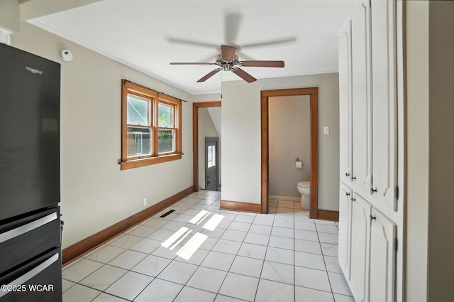 1574 Oakland Pkwy, Lima, OH 45805 - unfurnished room with a ceiling fan and crown molding