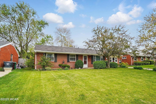 642 Meadowbrook Dr, Lima, OH 45801 - single story home featuring brick siding and a front lawn