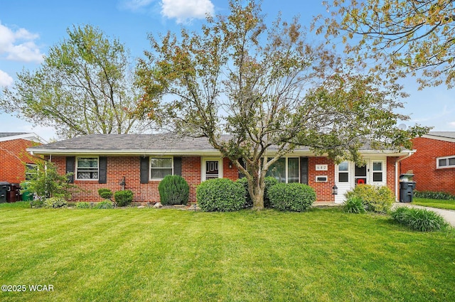 642 Meadowbrook Dr, Lima, OH 45801 - view of front of home featuring a front yard and brick siding