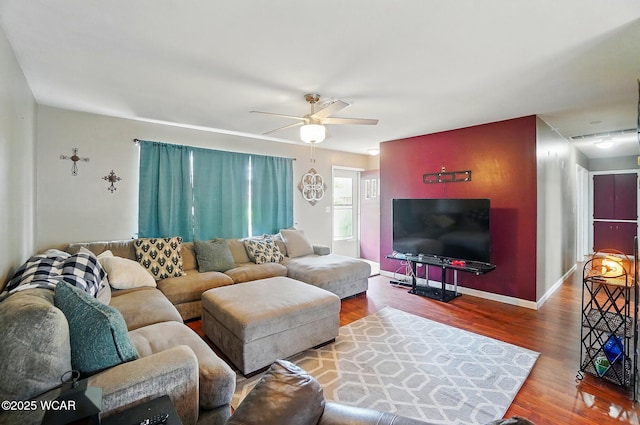 642 Meadowbrook Dr, Lima, OH 45801 - living room featuring wood finished floors, ceiling fan, and baseboards
