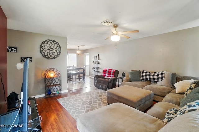 642 Meadowbrook Dr, Lima, OH 45801 - living room with ceiling fan, wood finished floors, and baseboards