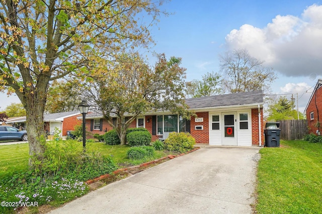 642 Meadowbrook Dr, Lima, OH 45801 - single story home with brick siding and concrete driveway