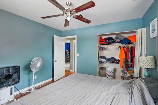 642 Meadowbrook Dr, Lima, OH 45801 - bedroom featuring a closet, wood finished floors, a ceiling fan, and baseboards