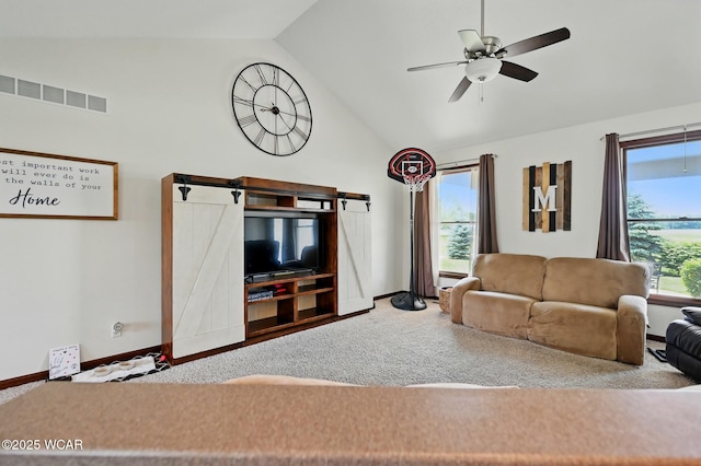 3901 Willow Oak Trl, Lima, OH 45807 - living area featuring carpet floors, a ceiling fan, baseboards, and high vaulted ceiling