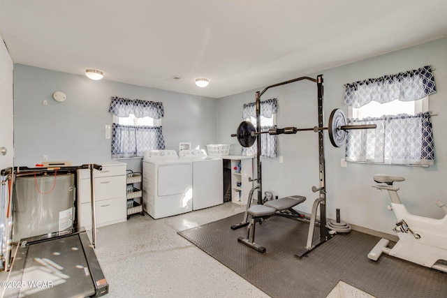 workout room featuring washer and dryer