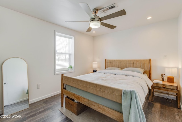 bedroom featuring dark wood-type flooring and ceiling fan