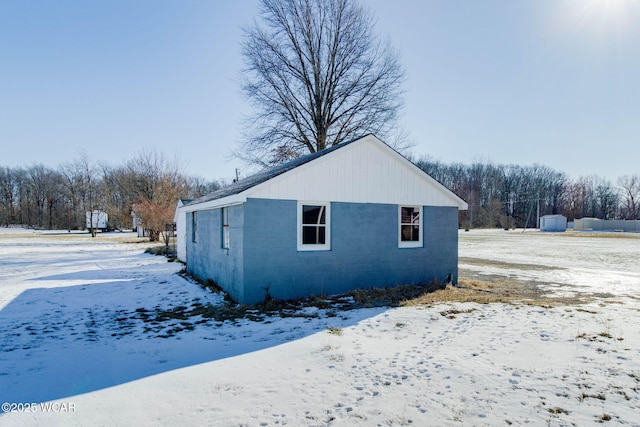 view of snow covered property