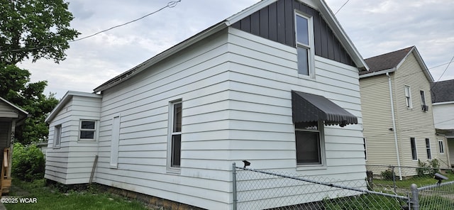 820 N Main St, Lima, OH 45801 - view of side of property featuring board and batten siding