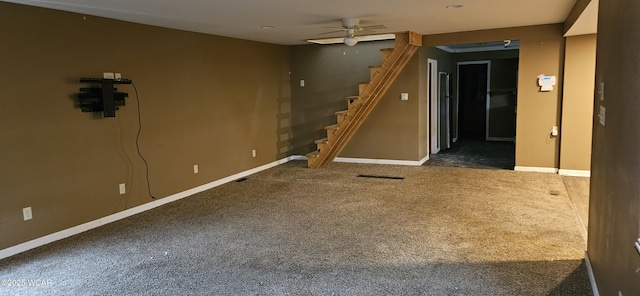 820 N Main St, Lima, OH 45801 - unfurnished living room with stairs, carpet, and ceiling fan