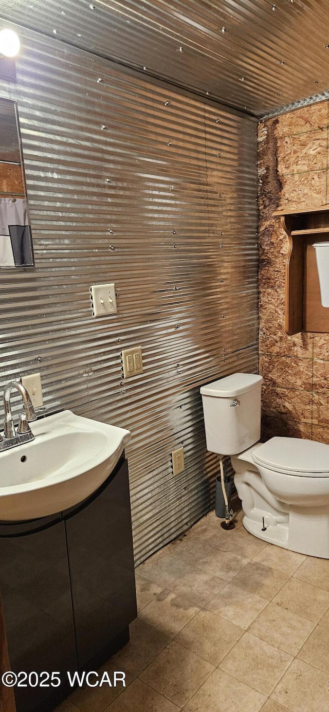 820 N Main St, Lima, OH 45801 - bathroom with vanity and tile patterned flooring