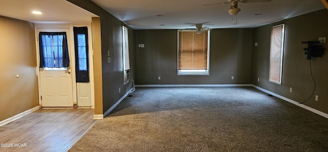 820 N Main St, Lima, OH 45801 - entryway featuring ceiling fan, carpet flooring, and wood finished floors