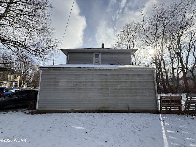 view of snow covered property