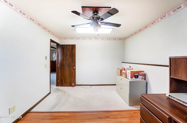 interior space featuring ceiling fan and light hardwood / wood-style flooring