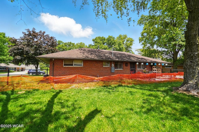 718 Wildwood Ave, Lima, OH 45807 - rear view of property featuring brick siding