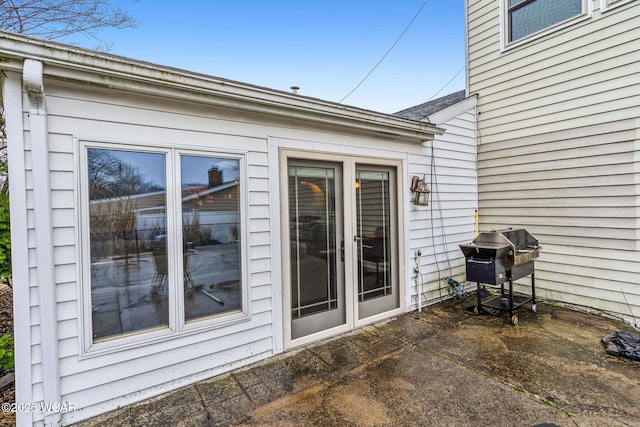 view of patio featuring a grill