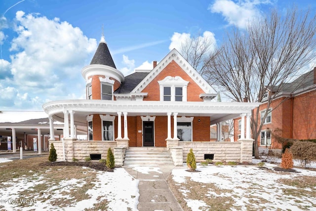 victorian-style house with a porch