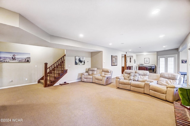 carpeted living area with stairs, french doors, baseboards, and recessed lighting