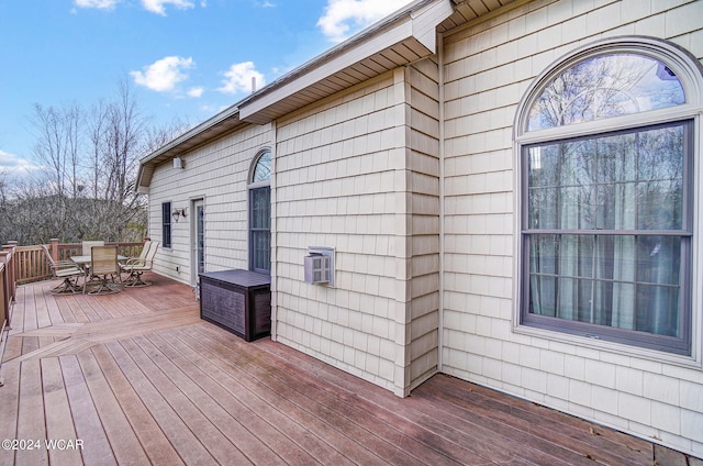 deck featuring outdoor dining area