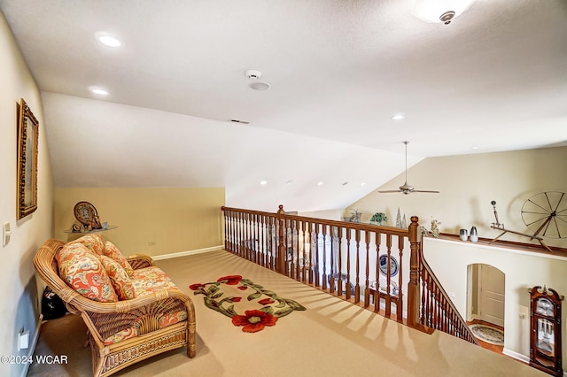 sitting room featuring recessed lighting, carpet flooring, a ceiling fan, baseboards, and vaulted ceiling