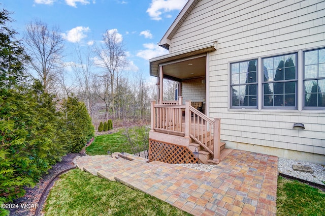 doorway to property featuring a patio