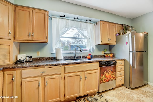 kitchen with sink, light brown cabinets, and appliances with stainless steel finishes