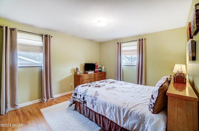 bedroom featuring light wood-type flooring