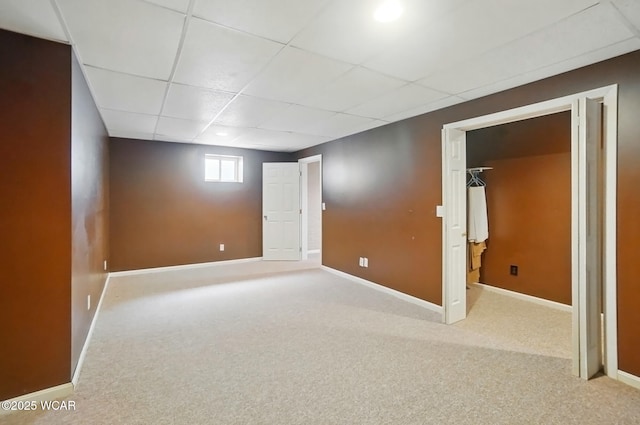 411 Ethan Cir, Bluffton, OH 45817 - carpeted empty room with baseboards and a drop ceiling