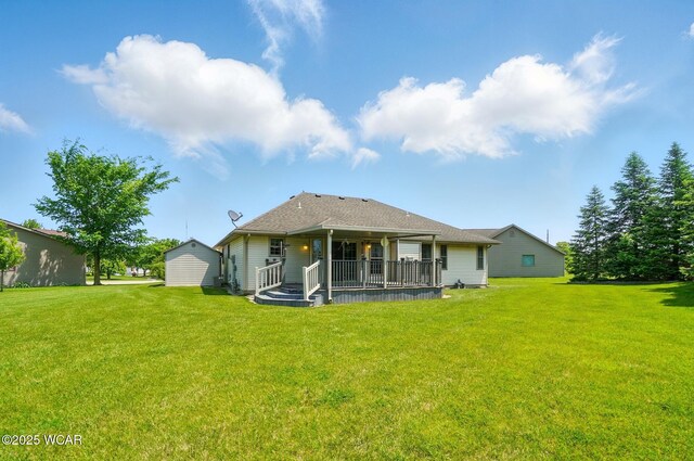 411 Ethan Cir, Bluffton, OH 45817 - back of property with a yard and a porch
