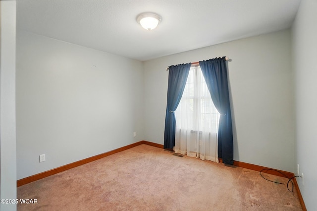 411 Ethan Cir, Bluffton, OH 45817 - unfurnished room featuring carpet flooring and baseboards