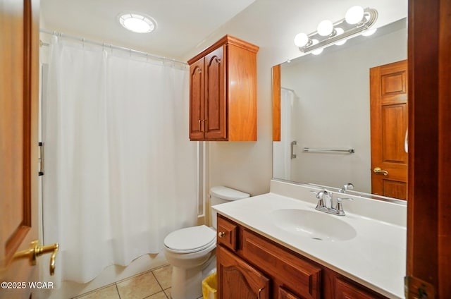 411 Ethan Cir, Bluffton, OH 45817 - bathroom with vanity, tile patterned flooring, toilet, and shower / bath combo with shower curtain