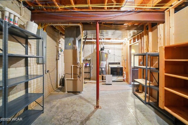 411 Ethan Cir, Bluffton, OH 45817 - unfinished below grade area with gas water heater and heating unit