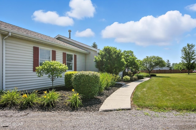 19318 Middle Point Rd, Van Wert, OH 45891 - view of property exterior featuring a lawn and a shingled roof