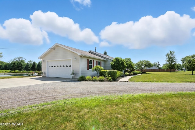19318 Middle Point Rd, Van Wert, OH 45891 - view of property exterior with driveway, a garage, and a yard
