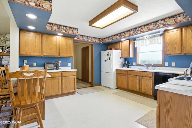 19318 Middle Point Rd, Van Wert, OH 45891 - kitchen with freestanding refrigerator, dishwasher, light countertops, light flooring, and brown cabinets