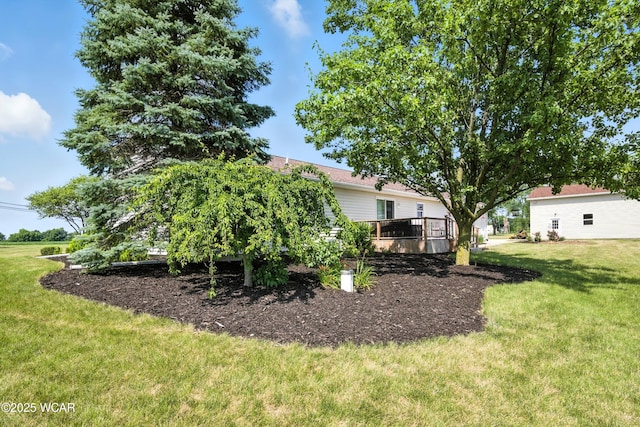 19318 Middle Point Rd, Van Wert, OH 45891 - view of green lawn with a wooden deck