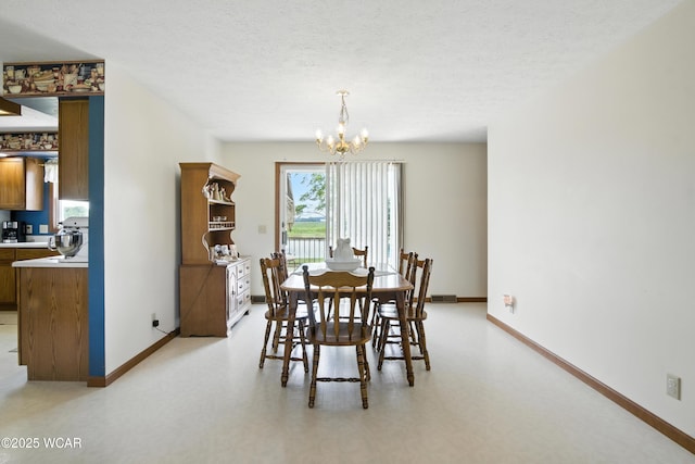 19318 Middle Point Rd, Van Wert, OH 45891 - dining room with a chandelier, a textured ceiling, and light flooring