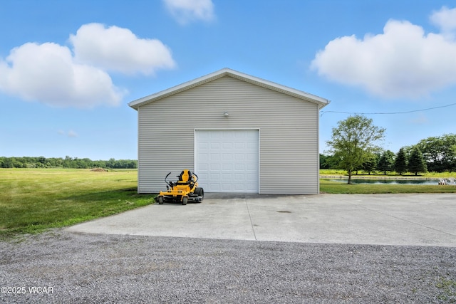 19318 Middle Point Rd, Van Wert, OH 45891 - detached garage with concrete driveway and a water view