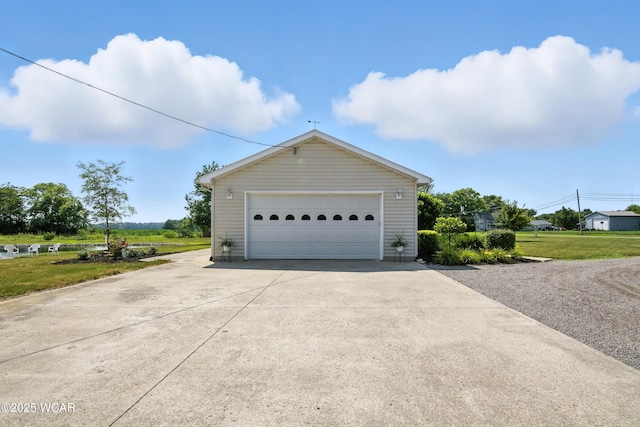 19318 Middle Point Rd, Van Wert, OH 45891 - view of home's exterior featuring a garage, an outbuilding, and a yard