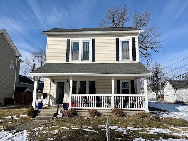 view of front of home featuring a porch and roof with shingles