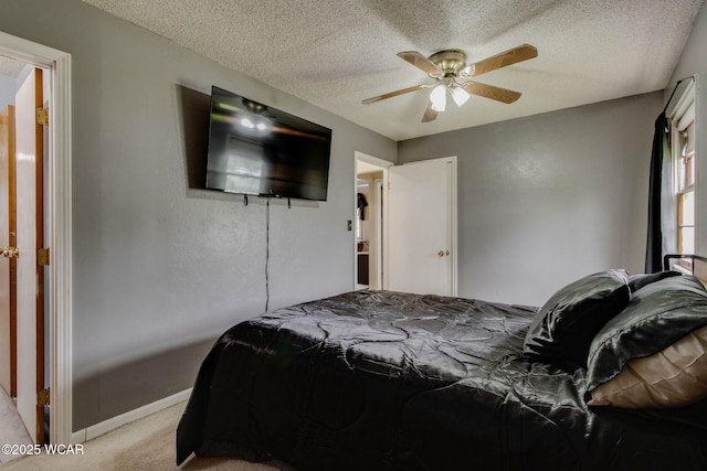 801 S Glenwood Ave, Lima, OH 45805 - bedroom featuring light colored carpet, baseboards, a textured ceiling, and a ceiling fan