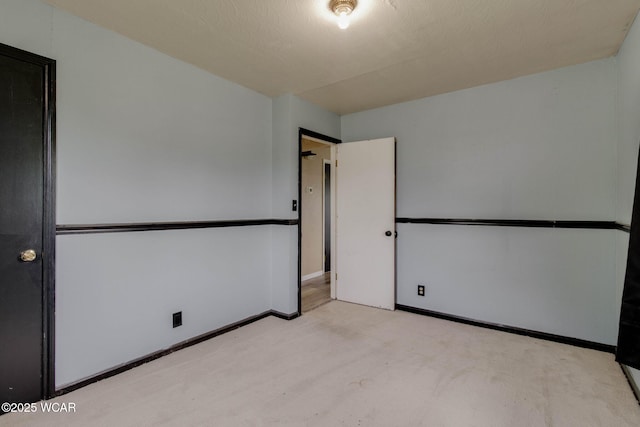 801 S Glenwood Ave, Lima, OH 45805 - empty room with light carpet and baseboards