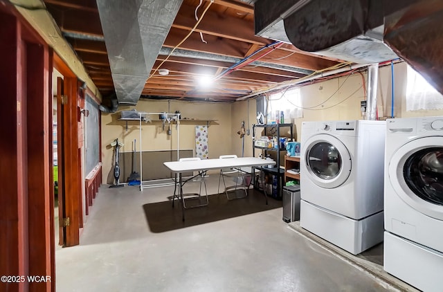 basement with washer and dryer