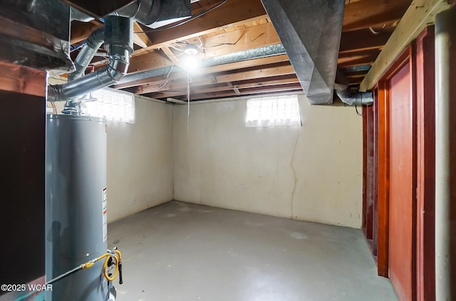 basement featuring water heater